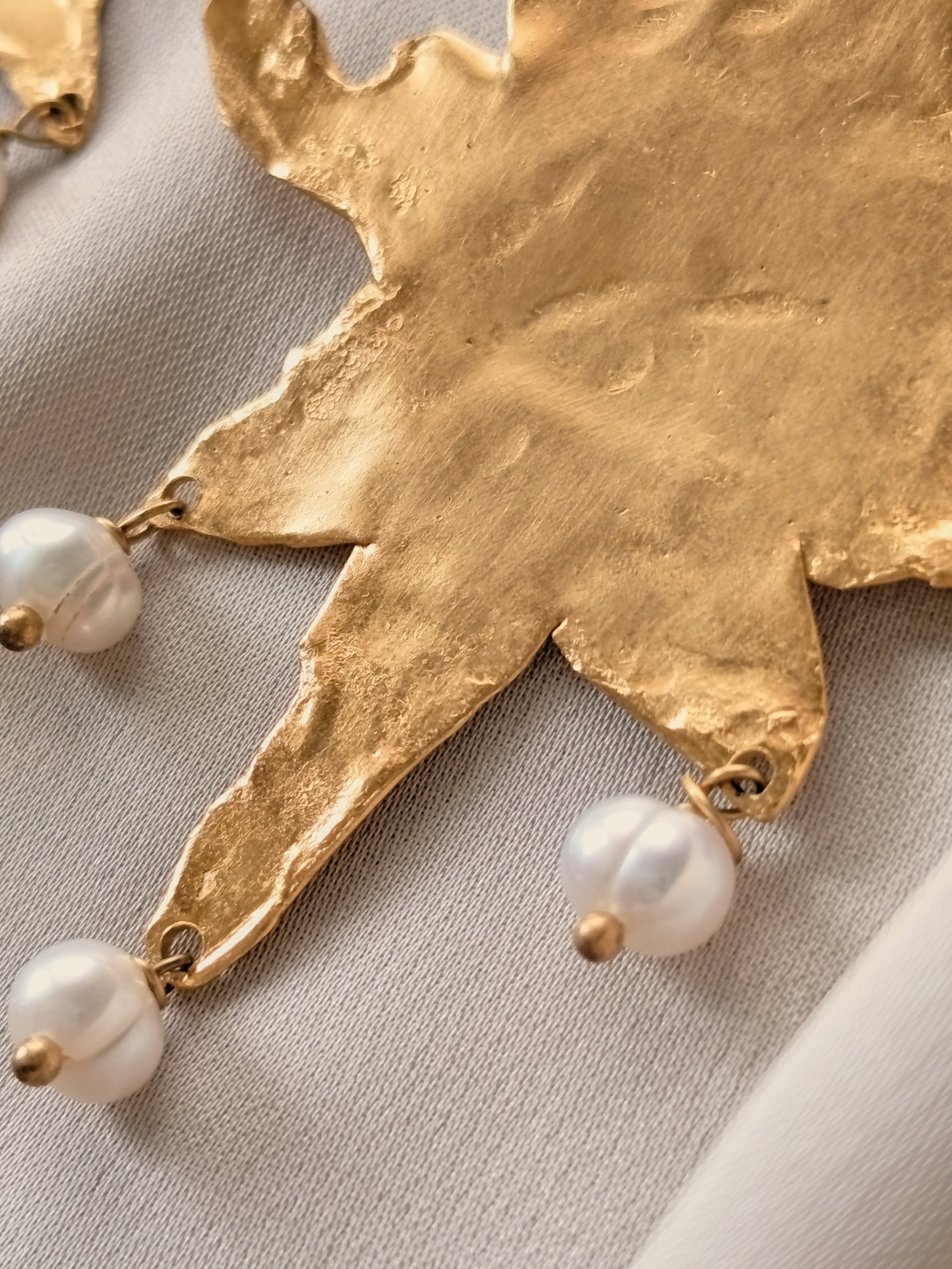 MELTED STAR EARRINGS