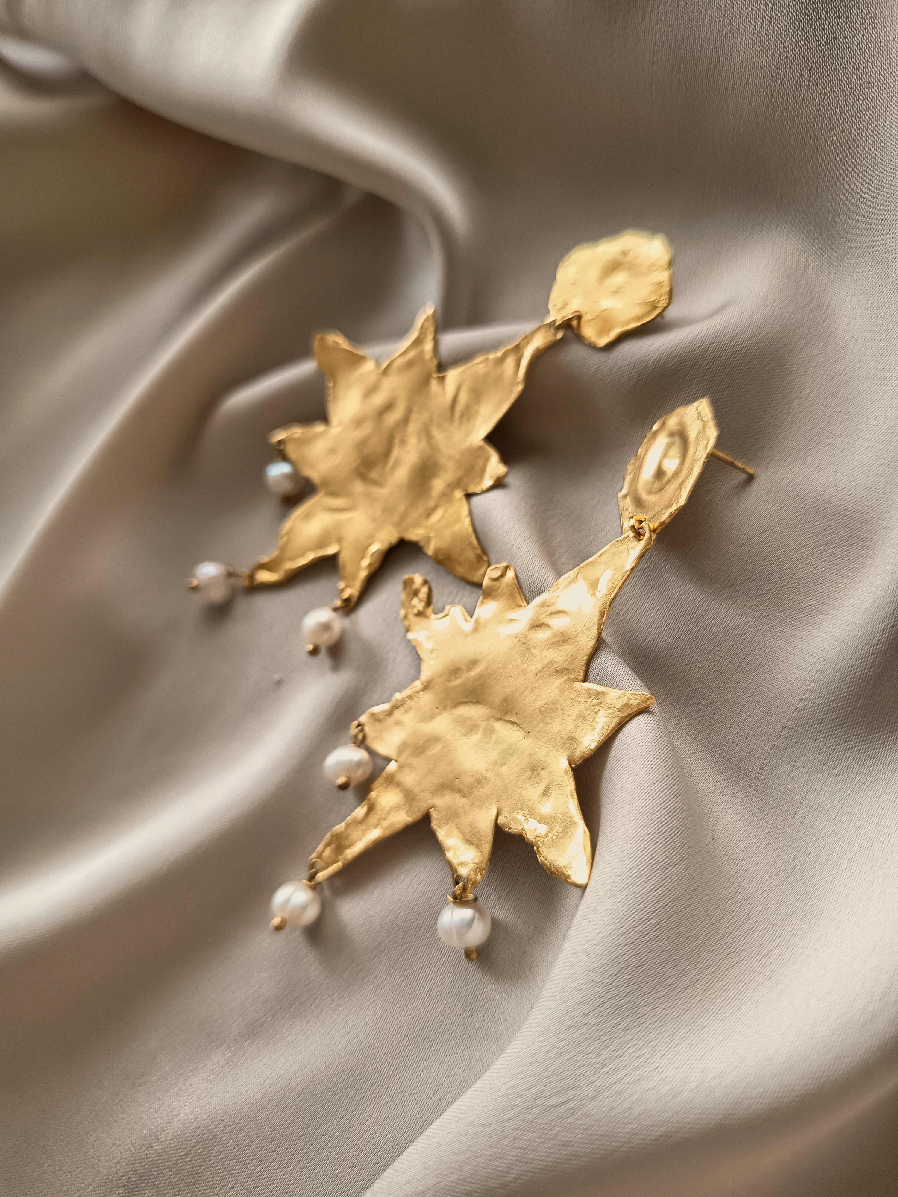 MELTED STAR EARRINGS